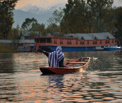 Snow capped mountains at Gulmarg, part of Kashmir tour package itinerary